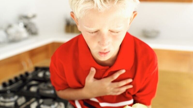 Boy choking foreign body
