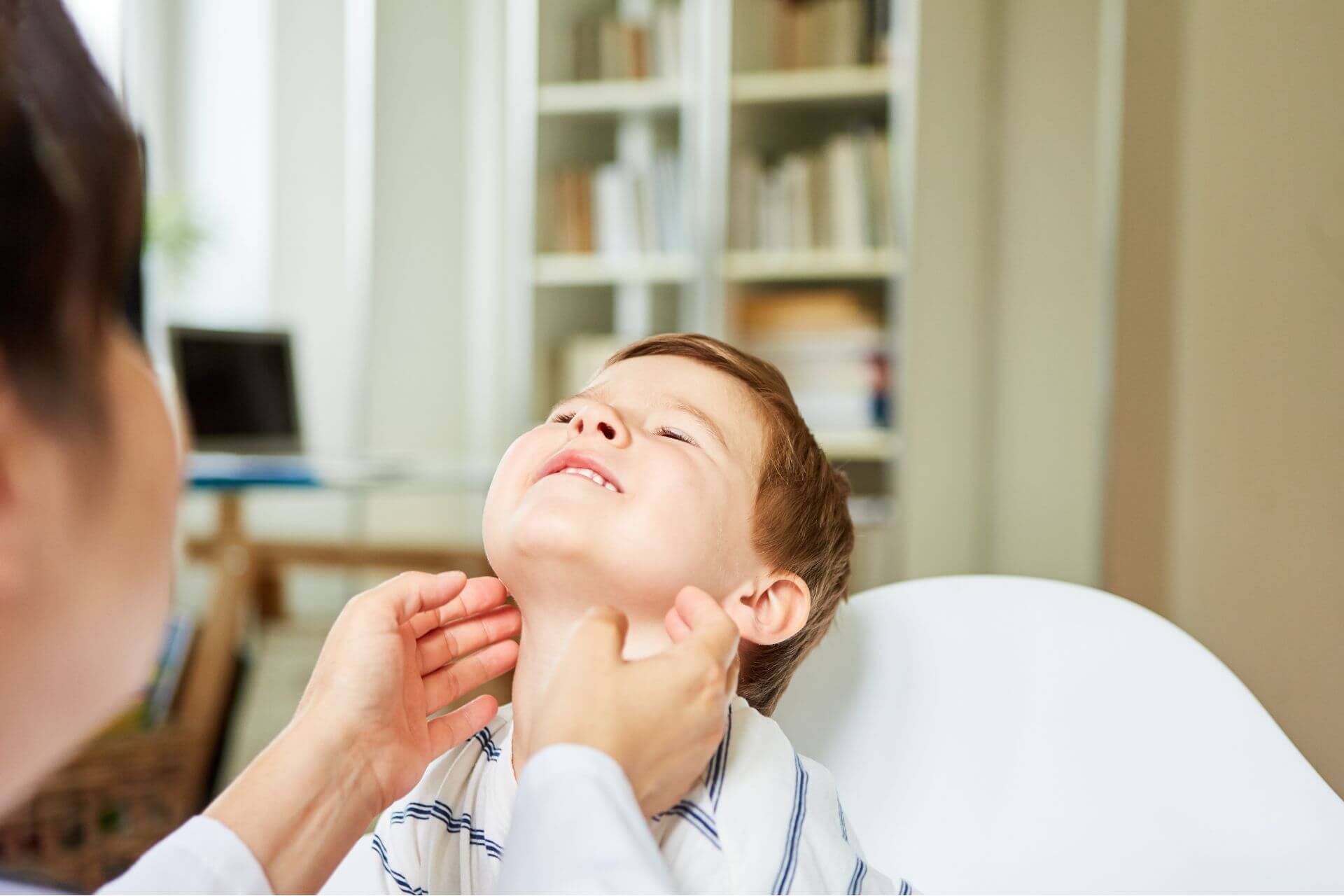 Checking boys tonsils